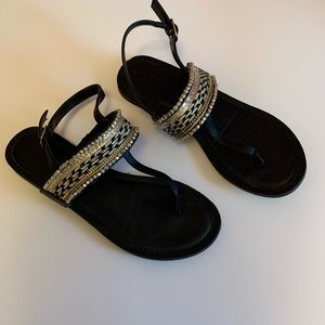 22. Black and Gold Fergalicious Sandals